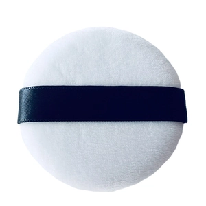 White crystal velvet powder puff with black silk ribbon handle for flawless makeup finish