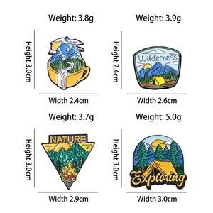 Outdoor adventure enamel pins set featuring mountain, campfire, and forest tent designs
