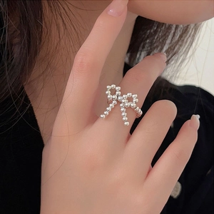 S925 sterling silver stretch beaded bow ring for women featuring a minimalist design