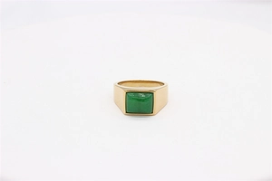 Detailed view of square green gemstone set in a vintage gold-plated titanium steel ring