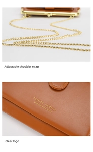 Detail view of brown leather bag with golden chain and adjustable shoulder strap