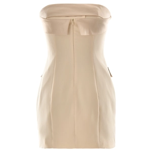 Detail of beige strapless mini dress back featuring invisible zipper and folded fabric edge