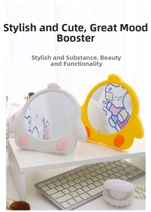 Detail shot of cute cartoon chick makeup mirrors in white and yellow on a desk organizer