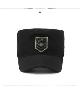 Close-up of black cotton cadet cap featuring a shield-shaped military embroidery patch