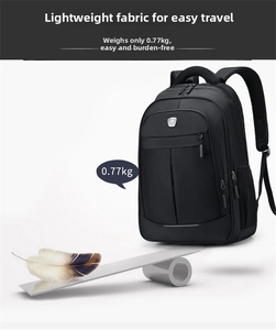 Lightweight black business laptop backpack weighing 0.77kg compared with a feather