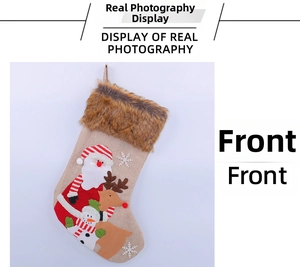 Detail of burlap Christmas stocking with faux fur cuff and 3D plush characters