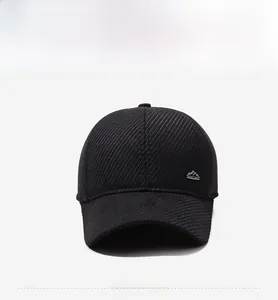 Detailed front view of black winter baseball cap featuring silver mountain metal emblem