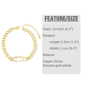 Detail view of gold safety pin bracelet showing link dimensions and lobster clasp features