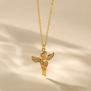Detailed view of Cupid angel pendant with heart and sparkling rhinestones on gold chain