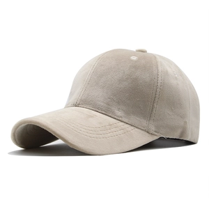 Macro detail of high-quality beige velvet fabric texture on a 6-panel baseball cap
