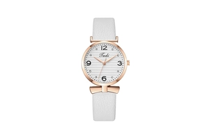 Detail of rose gold watch case with crystal accents and white bow knot ornament