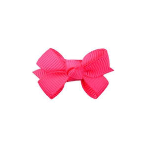 Detail of pink grosgrain ribbon bow with handmade ribbed texture for children's hair clip
