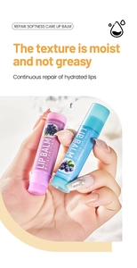 Detail of vitamin E and honey lip balm set with blueberry flavor in blue and pink tubes