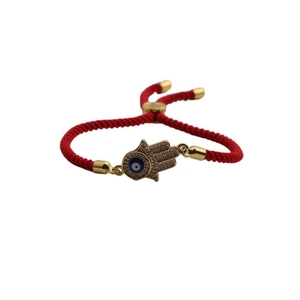 Adjustable red braided string bracelet with golden Hamsa Hand and blue Evil Eye charm