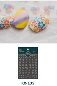 Macro detail of KX-135 3D embossed nail stickers featuring colorful floral textures