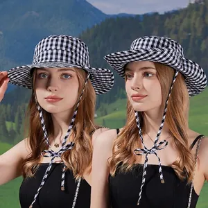 Women's black and white gingham wide brim sun hat with adjustable strap for hiking