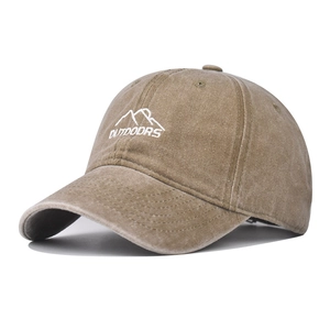 Distressed wash cotton baseball cap with mountain embroidery and Outdoors text in khaki