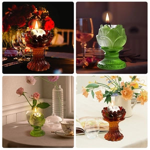 Detailed view of amber and green lotus glass candle holders with vintage embossed base