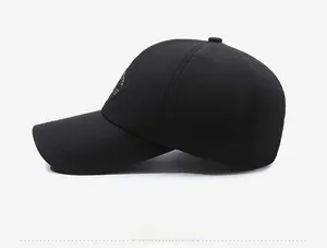 Side view of black sports baseball cap featuring mountain embroidery and SPORTS text