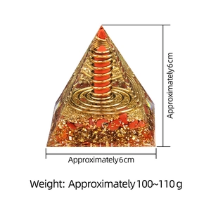 6cm Orgone crystal pyramid with resin, copper coil, red stones and gold foil