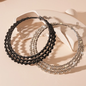 Exaggerated multi-layer rhinestone choker necklace in black and silver finishes