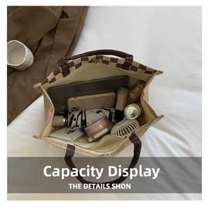Linen tote bag interior showing large capacity for laptop, umbrella, and cosmetics