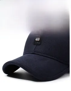 Close-up of navy blue winter baseball cap with warm wool fabric and Golf Sport patch