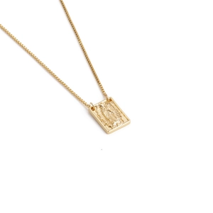 Detailed relief of Virgin Mary on a gold-plated rectangular pendant with a fine chain