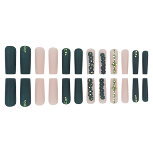 Long matte press-on nails in forest green and pink with floral accents and rhinestones