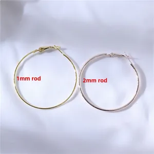 Detail of large 925 silver needle hoop earrings with 1mm and 2mm rod thickness options
