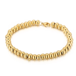 Polished gold beaded stainless steel bracelet with lobster clasp and charm ring