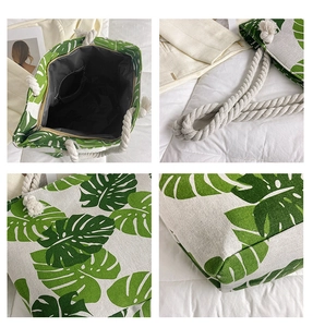 Detail view of canvas tote bag with thick rope handles and tropical monstera leaf print
