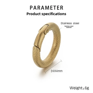 Macro detail of 24x4mm golden stainless steel round clasp with diamond pattern texture