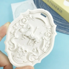 Detailed carousel relief on an oval plaster mold crafted from high-quality white silicone