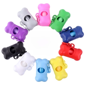 Macro detail of bone-shaped pet waste bag dispensers in ten vibrant colors with clips