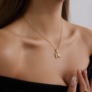 18K gold plated necklace with hammer-textured rectangular pendant and pink heart zircon
