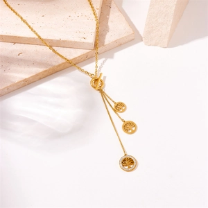 Gold-plated tree of life necklace with T-bar clasp and crystal accents on stone