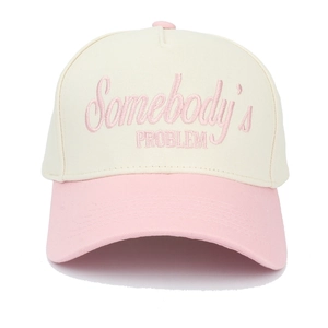 Detail of pink Somebody's Problem 3D embroidery on two-tone trucker baseball cap