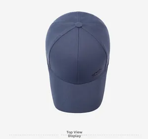 Top view of dark blue baseball cap featuring mountain embroidery and six-panel crown