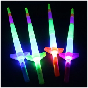 Detail of four multi-colored glowing LED light swords with vibrant neon illumination
