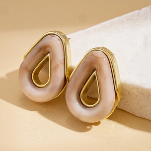 Retro hollow waterdrop stud earrings with beige resin marble texture in gold frame