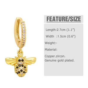 Detailed view of bee earring with dimensions 2.7cm by 1.5cm made of copper and zircon