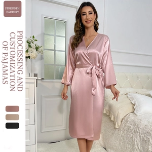 Elegant pink satin robe for women featuring a V-neck and belted waist for loungewear
