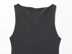 Detail view of the hidden back zipper on this dark grey sleeveless fashion dress
