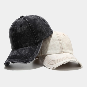 Vintage washed denim baseball caps with distressed brim details in grey and beige