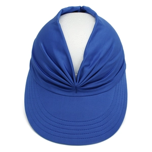 Detailed view of a blue empty top sun hat with pleated design and wide visor