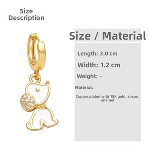 Close-up of cute cartoon dog earrings with 18K gold plating and shiny zircon detail