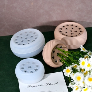 Flexible silicone spiral flower stem holder with multiple holes for floral arrangements