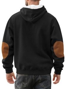 Rear view of black hoodie featuring textured geometric knit and brown elbow patches