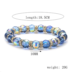 Detail of 10mm blue gradient faceted crystal beads with gold rhinestone spacers